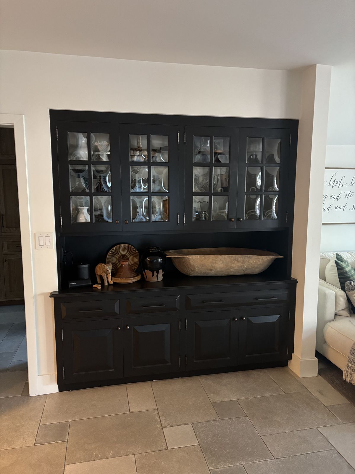 Black-painted built-in china hutch with glass doors in Solvang, CA